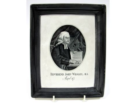 An Early XIX Century Pearlware Plaque, printed in black with a portrait of John  Wesley, in an oval panel and inscribed "Reve