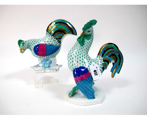 A Herend Porcelain Model of a Rooster, with green fish net body and multi-coloured feathers, on a shaped rectangular base, pr
