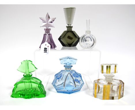 An Art Deco Tcheco-Slovaquie Glass Scent Bottle and Stopper, of octagonal form, decorated with gilt and cut bands, 11cm high;