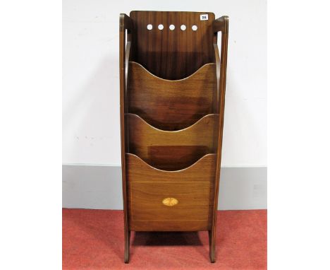 An Art Nouveau Inlaid Mahogany Magazine Rack, with pierced circular decoration, three divisions, on swept supports, 96cm high