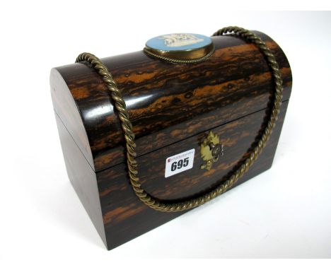A Mid XIX Century Coromandel Tea Caddy, of rectangular form with domed cover opening to reveal two covered compartments, appl