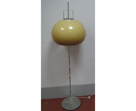 A 1960's /1970's Italian Chrome Floor Lamp, in the manner of Guzzini, with a rise and fall amber plastic shade, 163cm high.