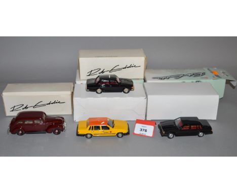 Four Rob Eddie white metal Volvo Taxi models in 1:43 scale, a 1950 PV831, a 1973 144GL, limited to 500 pieces, a 1987 740GL, 