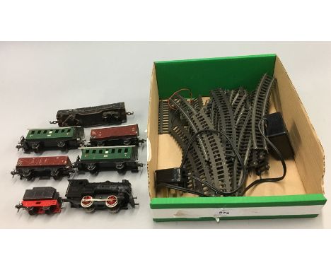 Fleischmann Engine , tender and rolling stock, together with a controller and a small qty of track