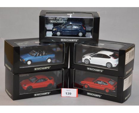 Minichamps. Five Ford diecast model cars in 1:43 scale, including Focus RS, Capri III GT4, Fiesta, Escort Cabriolet and Puma 