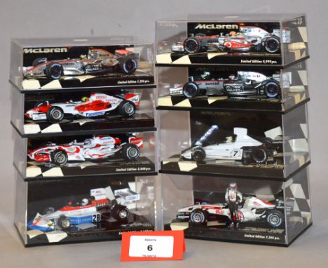 Minichamps. Eight 1:43 scale F1 diecast model cars : two  McLaren Mercedes MP4-21 P. De La Rosa and K Raikkonen, Vodaphone Mc