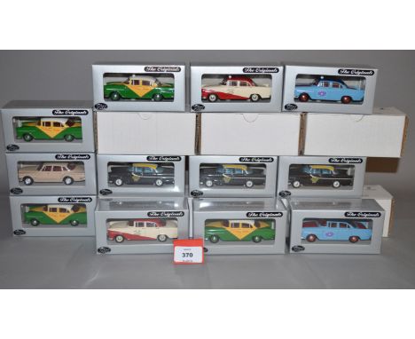 Twelve boxed Trax diecast taxi models in 1:43 scale, overall appear VG in VG boxes.  (12)