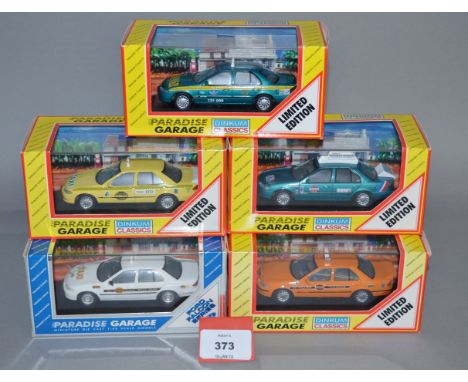 Four boxed Paradise Garage diecast Ford Falcon Taxi models in 1:43 scale, each being a limited edition of 500 pieces, togethe