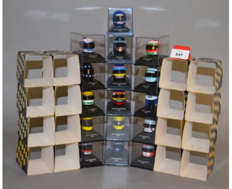 Minichamps. Sixteen  diecast Helmets in 1:8 scale from various different collections including 'Team Rosberg', 'Jacques Ville