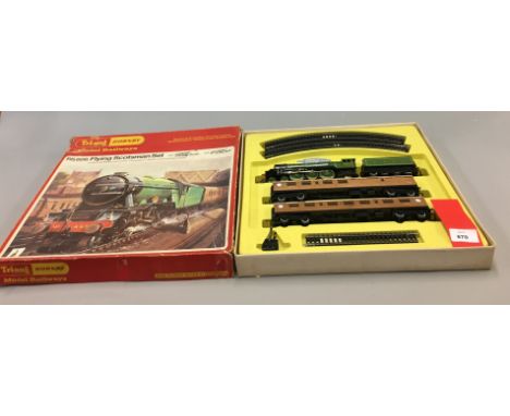 OO/O gauge. Hornby OO gauge RS608 Flying Scotsman Set; Brimtoy O gauge 317 Set; Hornby O gauge M5 set. All boxed, F-G. (3)