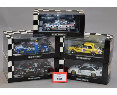 Minichamps. Five Opel diecast model cars in 1:43 scale including Commodore, Omega and Vectra  variants with two of the Vectra