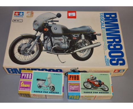 Tamiya 1:6 scale BMW R90S motorcycle plastic model kit. Appears complete (not checked), unstarted. Together with two Pyro 1:1