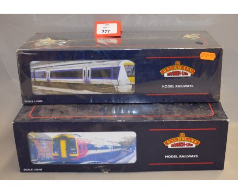 OO gauge. Bachmann 3-car DMUs: 31-514 159 'Southwest Trains'; 32-470 168/1 Clubman 'Chiltern Railways'. G/VG, boxed. (2)