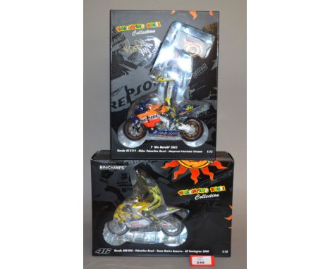 Minichamps. Two Valentino Rossi Honda diecast Motorbike models with rider figures in 1:12 scale, a Honda RC 211V Repsol Honda