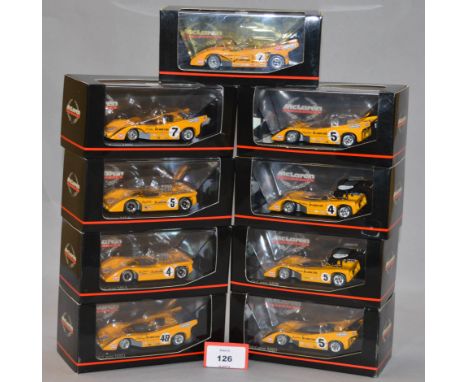 Minichamps. Nine McLaren M8 CanAm diecast model cars in 1:43 scale. All of the models are limited editions. All  are boxed an