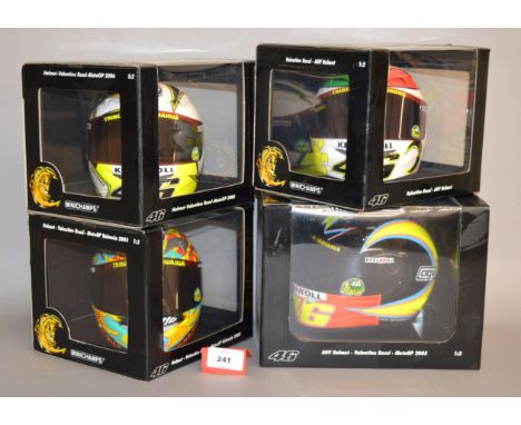 Minichamps. Four Valentino Rossi diecast Helmets in 1:2 scale, AGV MotoGP 2005 and 2006 and Moto 2006 together with Helmet Mo