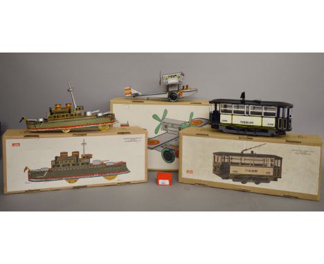 13 x Paya reproduction tinplate toys, including planes and ships. Boxed. Together with one unboxed item.