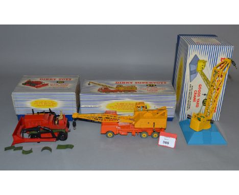 Three boxed Dinky Toys, 961 Blaw Knox Bulldozer, 972 Coles Crane Lorry and 973 Goods Yard Crane. Overall models appear G+  in