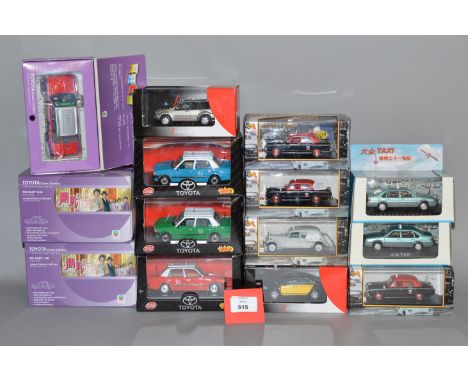 14 x assorted diecast model taxis, all boxed and appear VG.