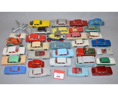 A quantity of unboxed vintage Dinky Toys diecast models, mostly cars, including an Austin Atlantic, a 195 Jaguar 3.4l in grey