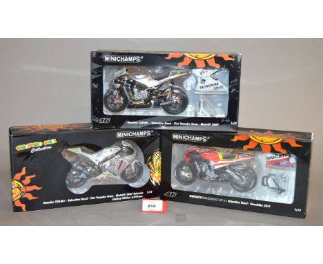 Minichamps. Two Yamaha YZR-M1 Valentino Rossi diecast Motorbike models in 1:12 scale, a Fiat Yamaha Team MotoGP 2009 and a Mo