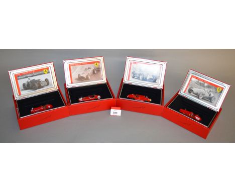 Four Hot Wheels diecast Ferrari models in 1:43 scale including a 1949 125 F1, 1952 500 F2, 1956 D50, and a 1959 246 F1. All o