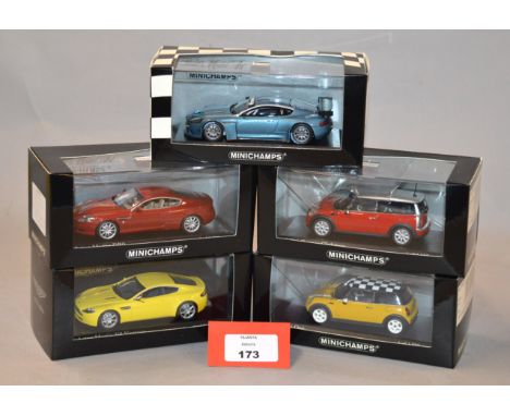 Minichamps. Three Aston Martin diecast model cars in 1:43 scale including V8 Vantage, DB9 and DBRS9 'Launch Version' together