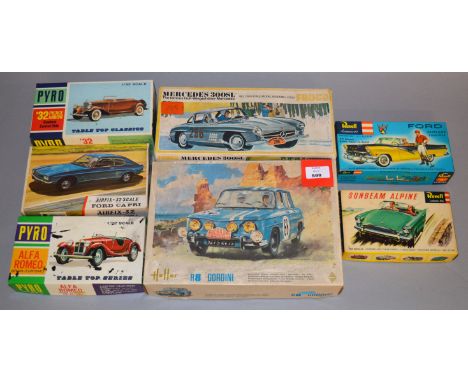 14 x plastic model kits, all cars, by Revell Cadet Series, Airfix-32, etc. Appear complete but some started.