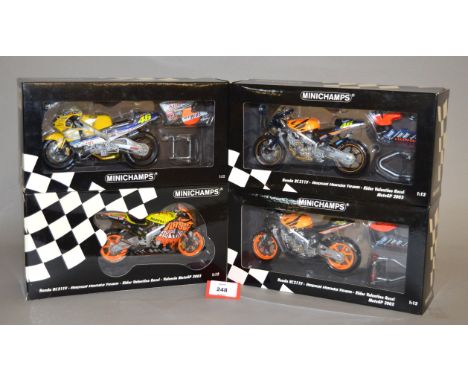 Minichamps. Three Yamaha YZR-M1 Valentino Rossi Repsol Honda Team diecast Motorbike models in 1:12 scale, MotoGP 2002, 2003, 