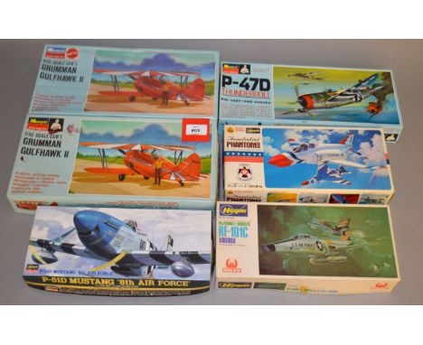 20 x plastic model kits, all aircraft, by Revell, Lindberg, Heller, etc. Mostly appear unstarted and complete.