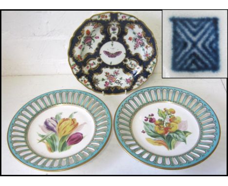 WORCESTER PLATE, circa 1772, painted flowers and insects within reserved panels on a blue ground, 21.5cm diam plus a pair of 