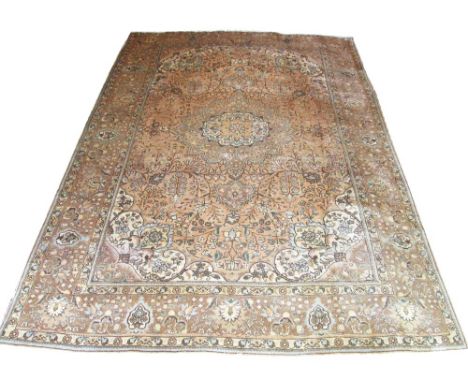 FINE TABRIZ CARPET, 346cm x 249cm, central medallion with palmettes and scrolling vines within spandrels on a gold field and 