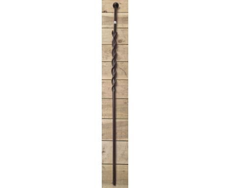 Dark wood Hand carved staff designed with two snakes twisting round the staff. Having a bulbous handle like a knobkerrie. [14