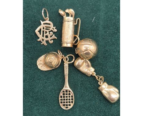 Six 9ct yellow gold sporting charms; Golf bag, jockey hat, boxing gloves, tennis racket, football and Rangers football club p