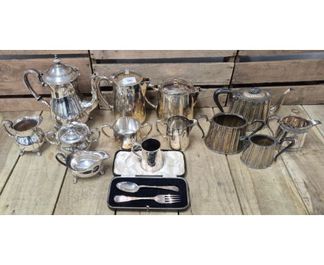 A selection of Silver plated wares; Three silver plated tea services- Victorian three piece tea service, boxed Fork and spoon