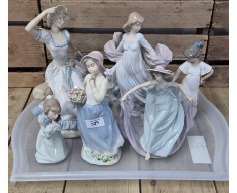 A Tray of Spanish Porcelain Nao/ Lladro Figurines; Courtesy girl, Ballroom dancer, Large Woman figure sitting &amp; others