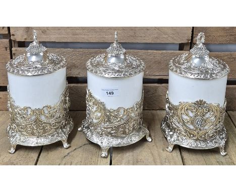 A Collection of three Plated jewelled tea caddy cannisters with lids 
