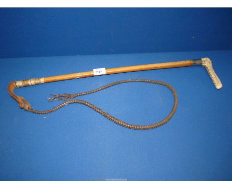 An antler handled Whip with silver collar, London 1890.