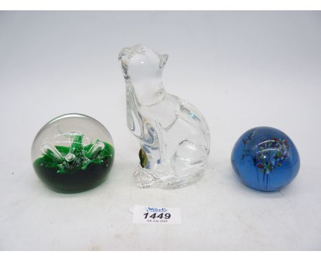 Three glass paperweights including Waterford cat, Caithness 'Moonflower'  and one other. 
