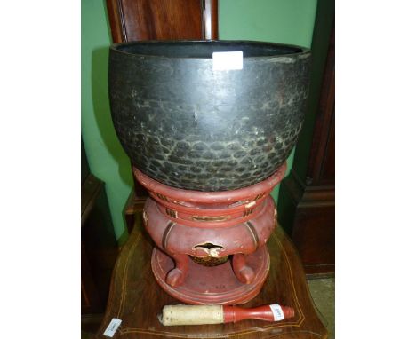 A Japanese bronze Gong on painted base with padded stick for striking, 21" tall x 14" diameter including base.