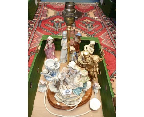 A quantity of figures including an A. Belcari lamp base, Spanish lady with flower basket, Franklin porcelain 'Something Sweet