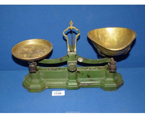 A pair of green and brass 'W.T. Avery' weighing scales.