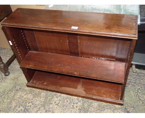 A Rosewood floor standing Bookshelves having a shelf adjustable for height, 35'' wide x 9'' deep x 28 3/4'' high.