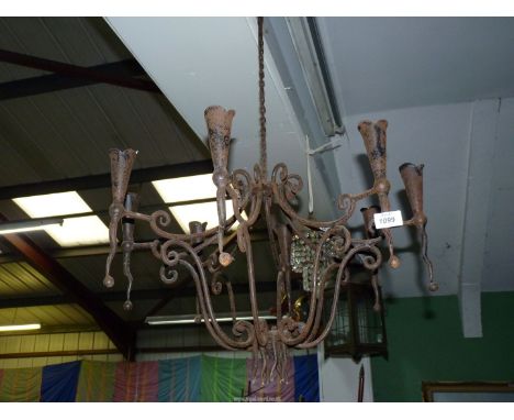 A Gothic wrought iron chandelier/ceiling light.