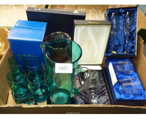 A quantity of miscellaneous glass, to include: a six person water set, a heavy cranberry and clear glass vase, a boxed set of