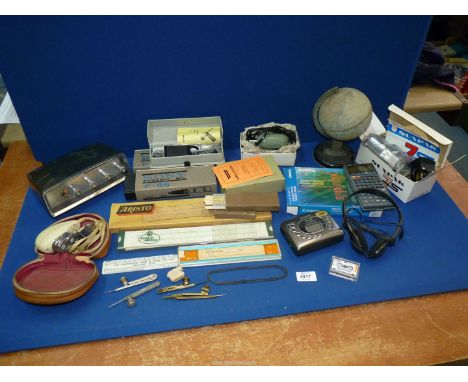 A quantity of miscellanea including: Casio Graphic slide rules, two cased Sony F-96 Dynamic Microphones, Ferguson clock radio