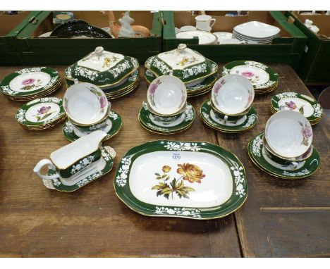A floral with green and white border Spode eight person dinner service, to include: soup soups and saucers, tea plates, side 