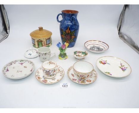 A quantity of mixed china including coffee cans and saucers, Royal Worcester, blue Royal Torquay vase and Swansea plate.