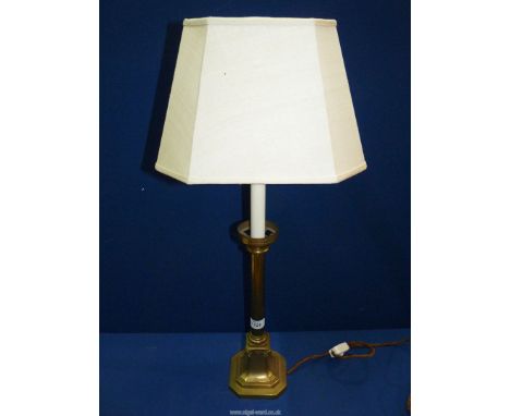 A brass table lamp with square silk shade, 28 1/2'' tall including shade.