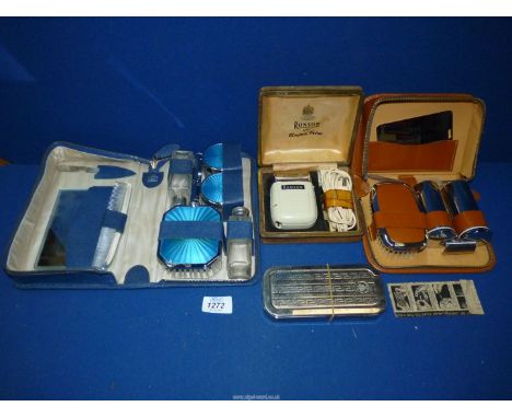 A Gents and a Ladies travel wash set (ladies having engine turned detail to the pot lids and brush back), vintage Ronson shav